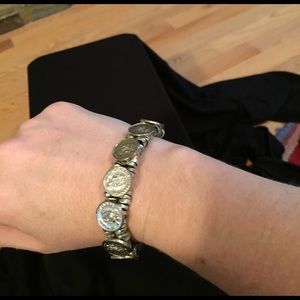 Unique silver coin ribbon bracelet