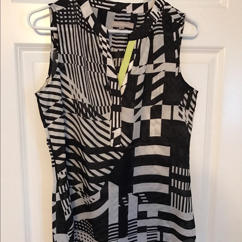Sleeveless black and white blouse