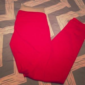 Red skinny maternity pants with knit panel