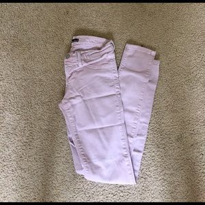 Light pink skinny jeans.