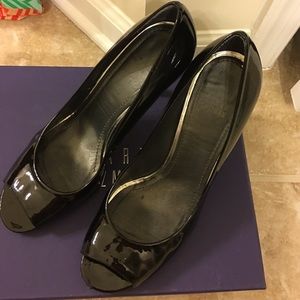 Stuart Weitzman black patent pumps