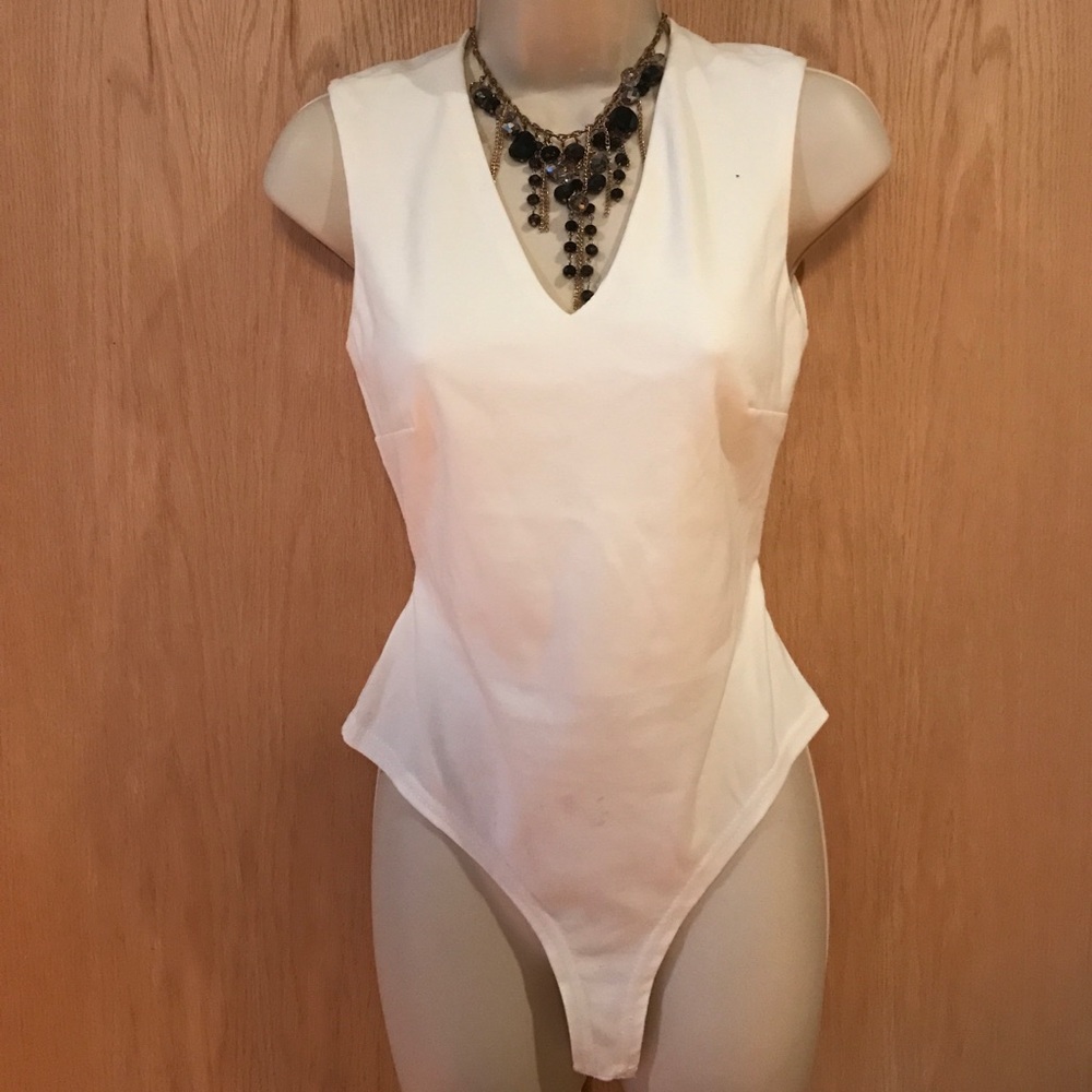 ***SOLD*** Low V bodysuit