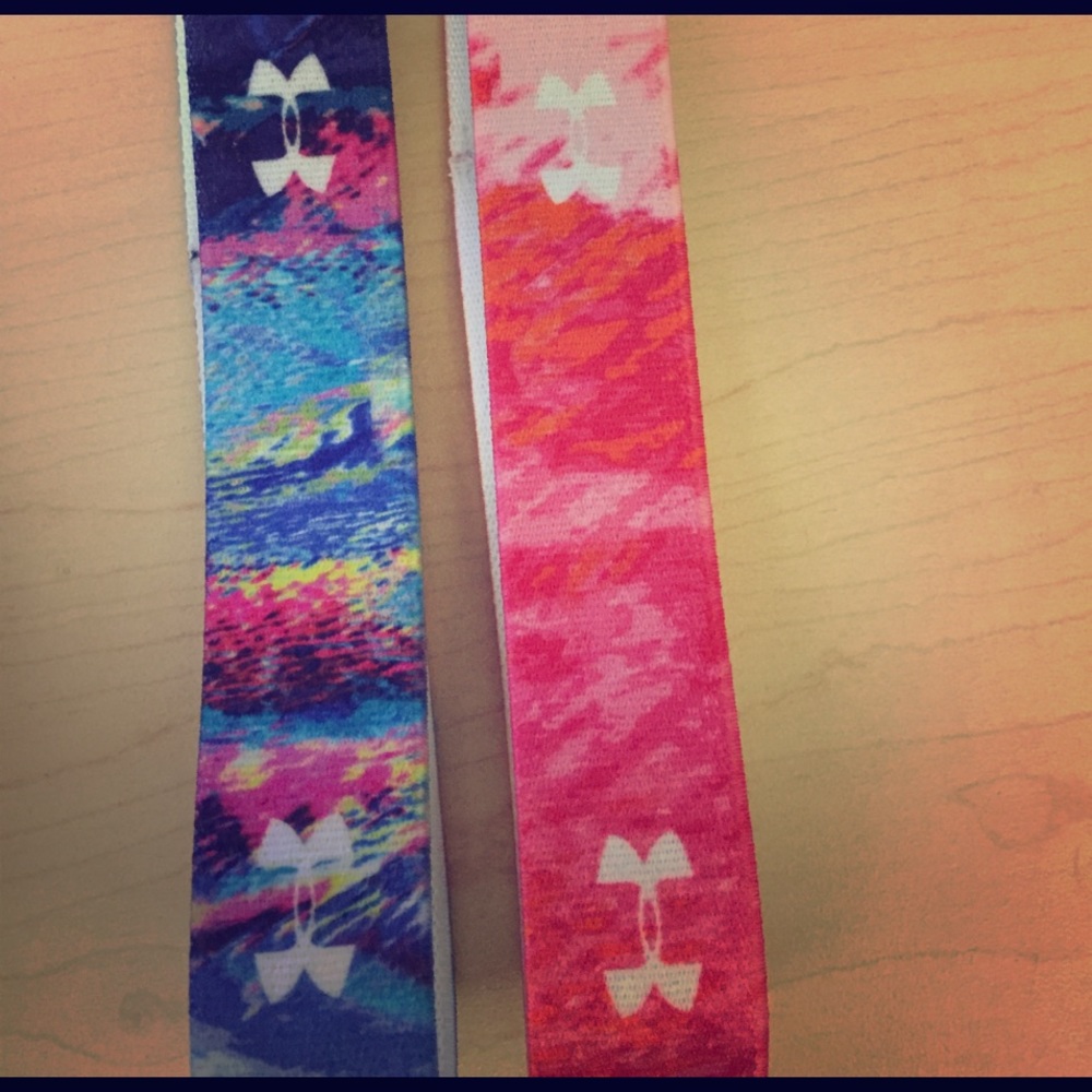 Two under armor headbands