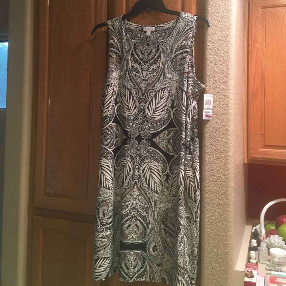 Black, white and beige dress.