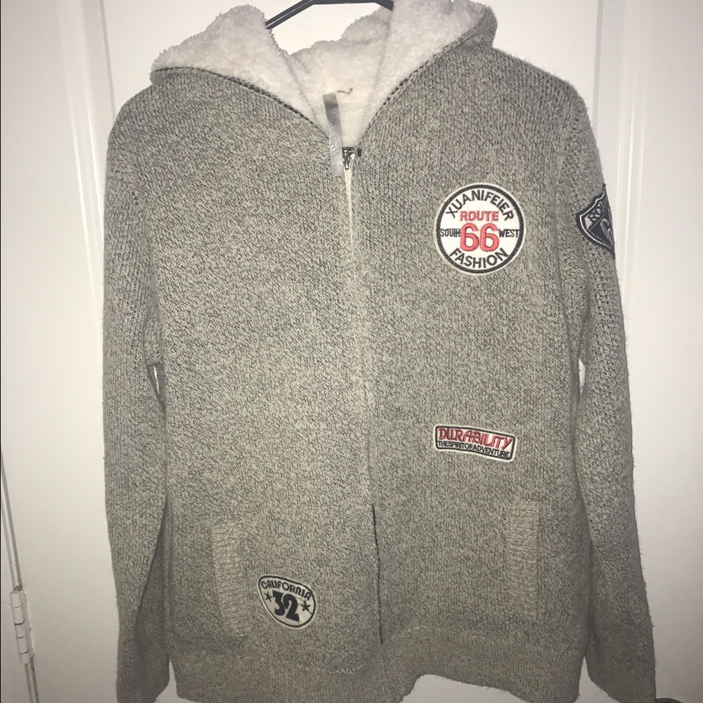 Sweater with patches and fur inside