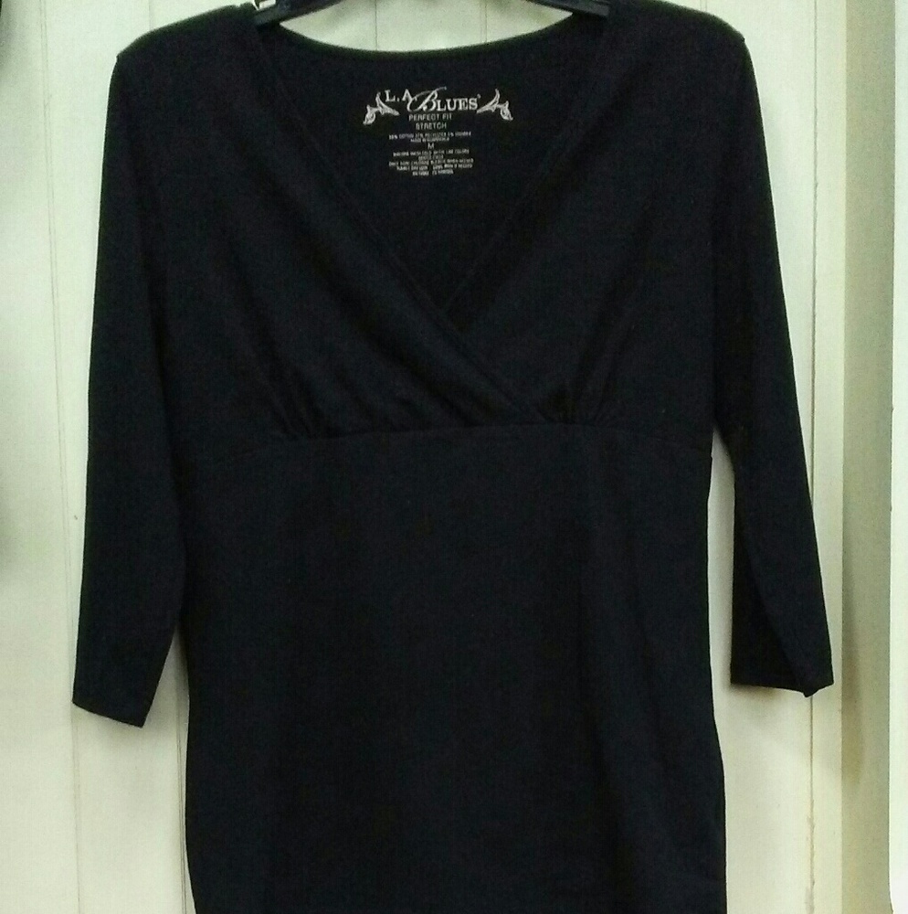 Black. LA. Blue top