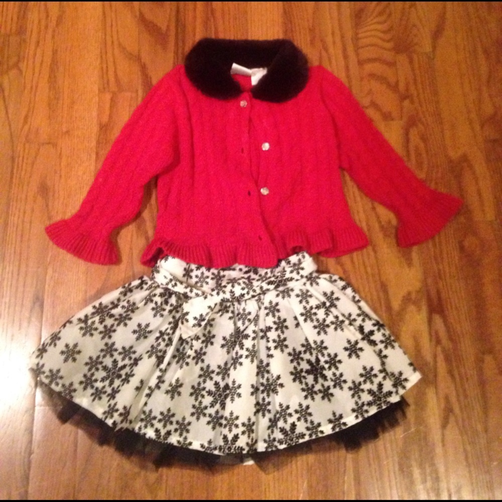 Red sweater/black and white skirt