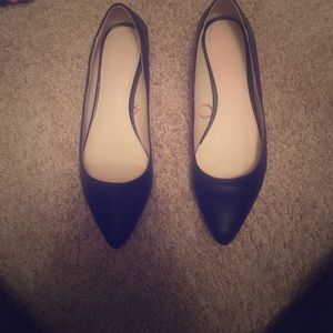 Black pointed flats