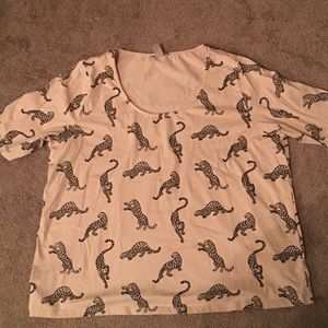 Light pink shirt with cheetahs on it