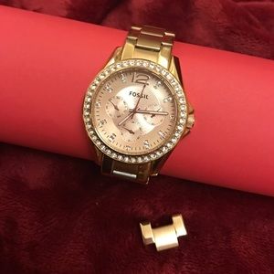 Gold fossil watch