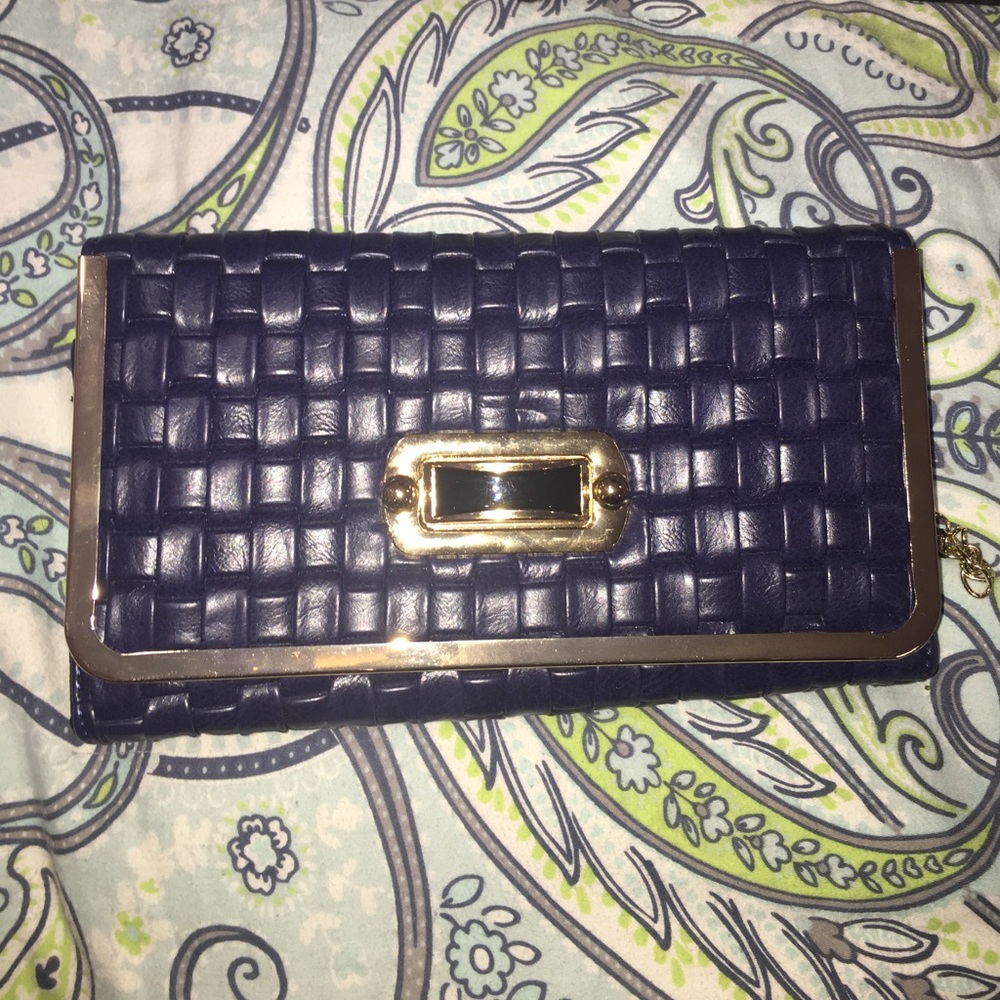 Navy blue quilted clutch
