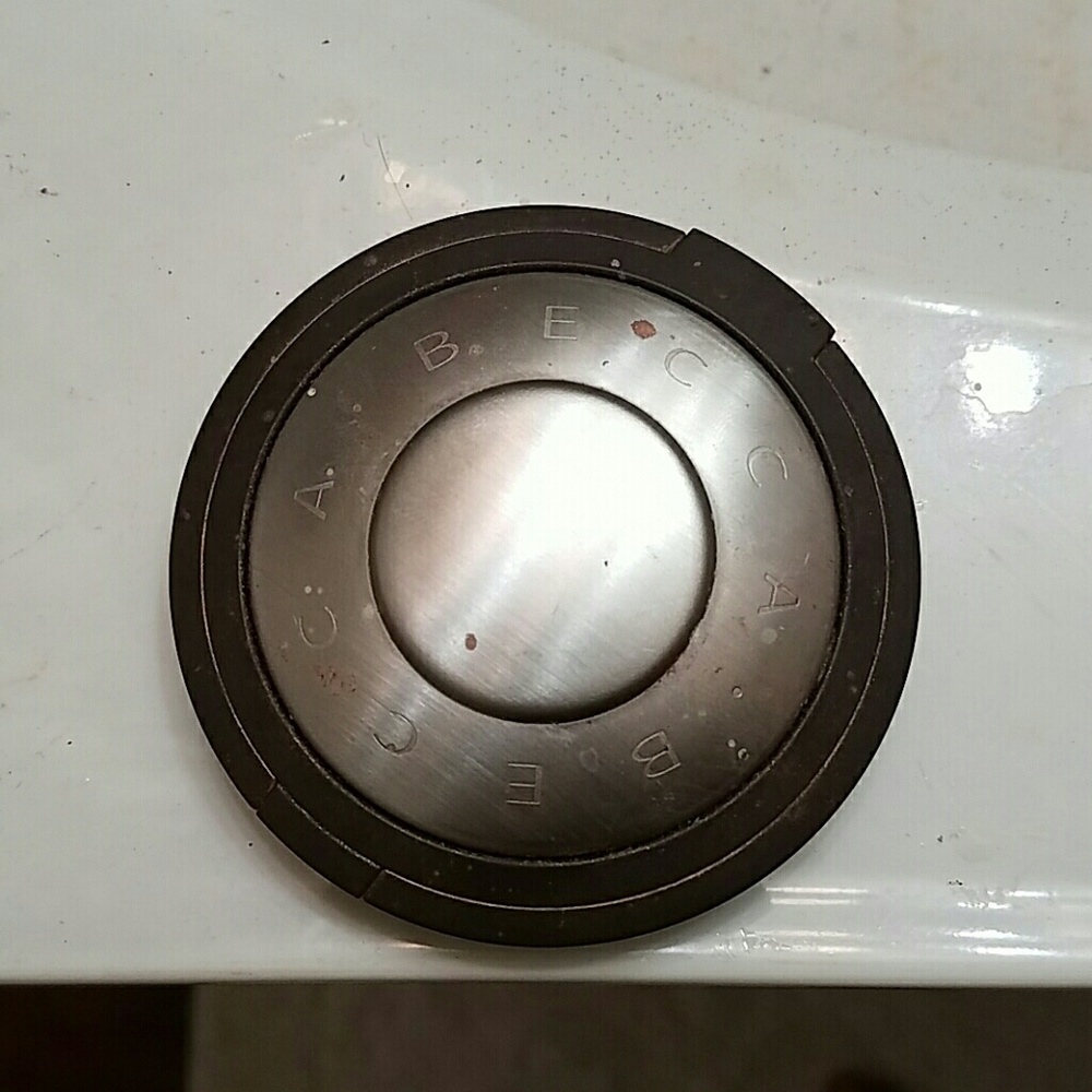BECCA COSMETICS TOPAZ HIGHLIGHTER