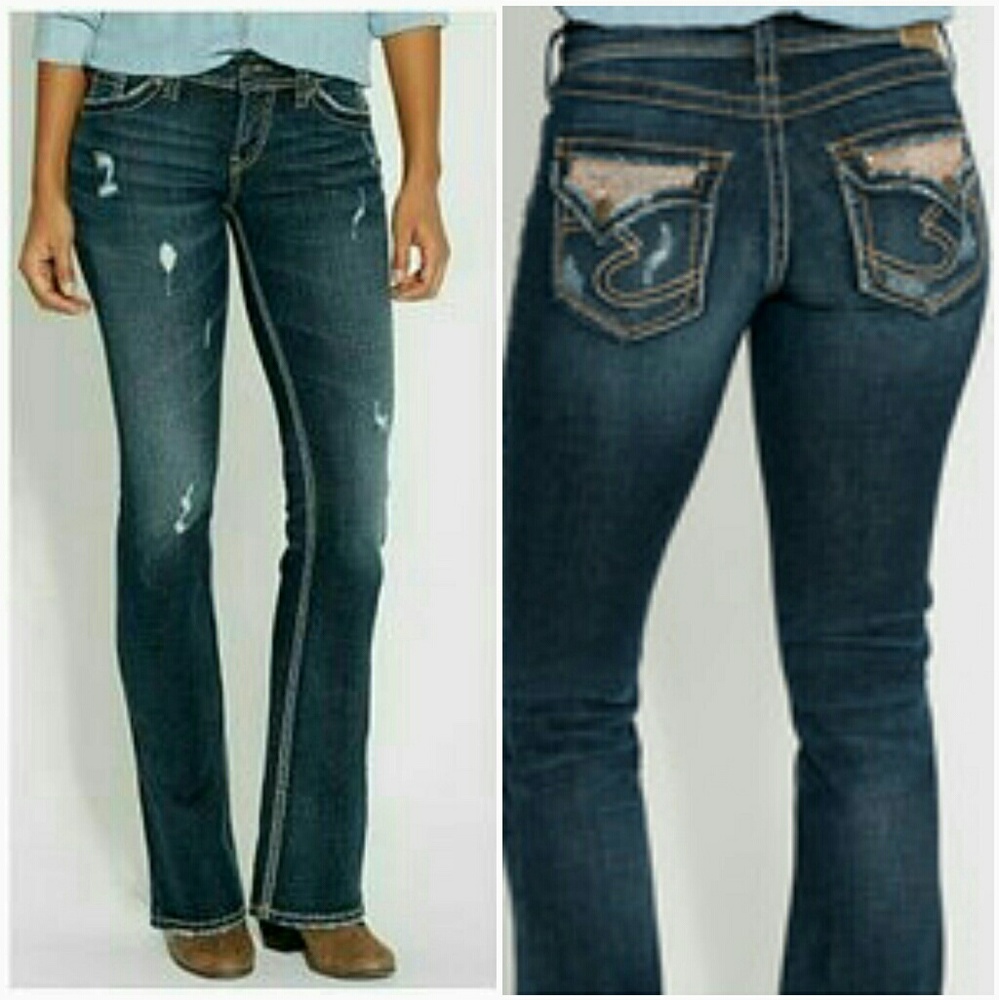 Silver bootcut jeans.(suki)