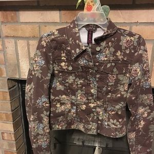 Brown jacket with beautiful flowers.