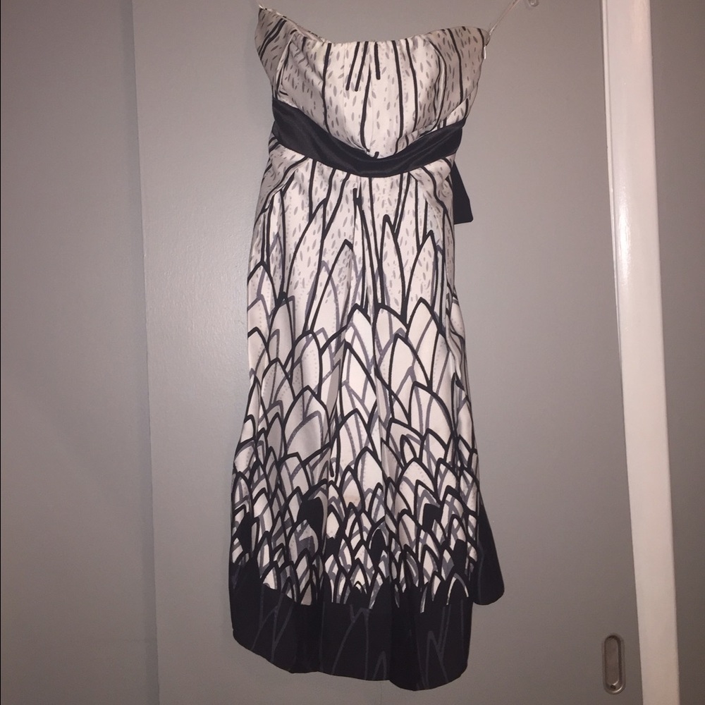 Grey and black knee length dress.