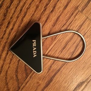 Prada triangle key ring.  Black with silver.