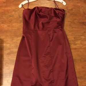 Red satin sleeveless mid length dress