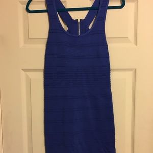 Indigo blue body con.  Strapped back dress