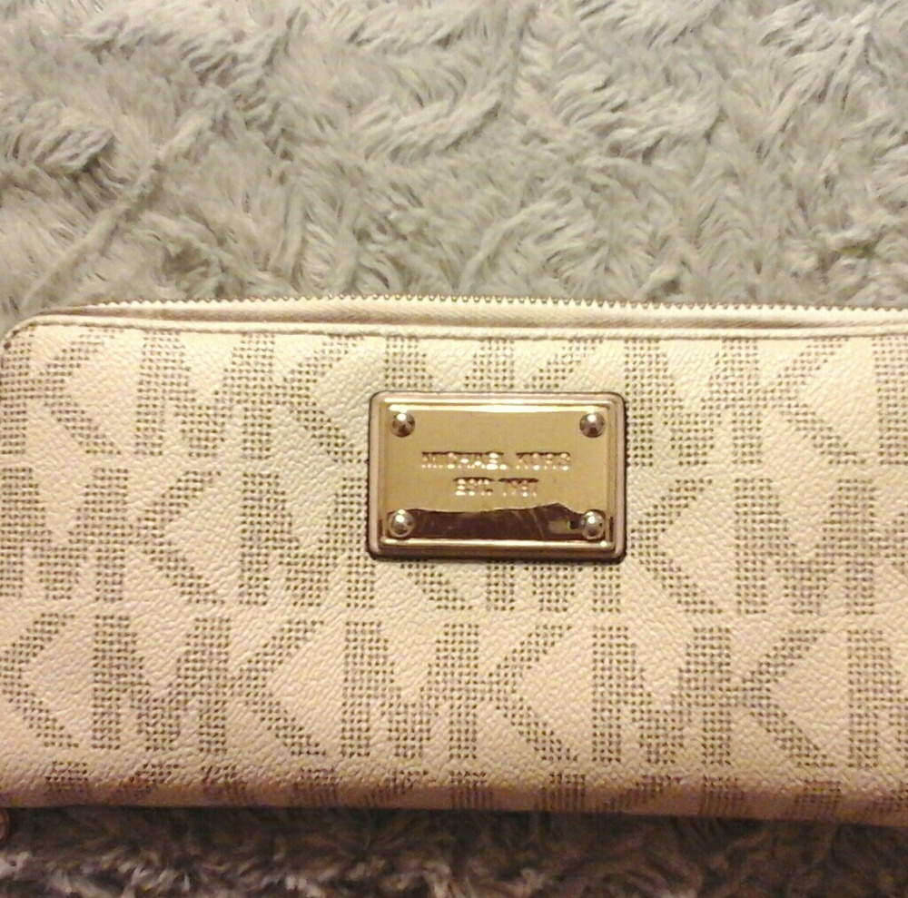 Michael Kors travel wallet .
