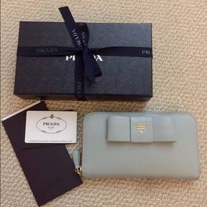 Prada saffiano bow zip-around wallet