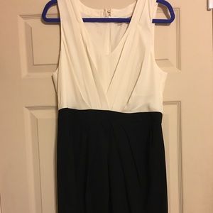 Blousy sleeveless cream top, black bottom dress