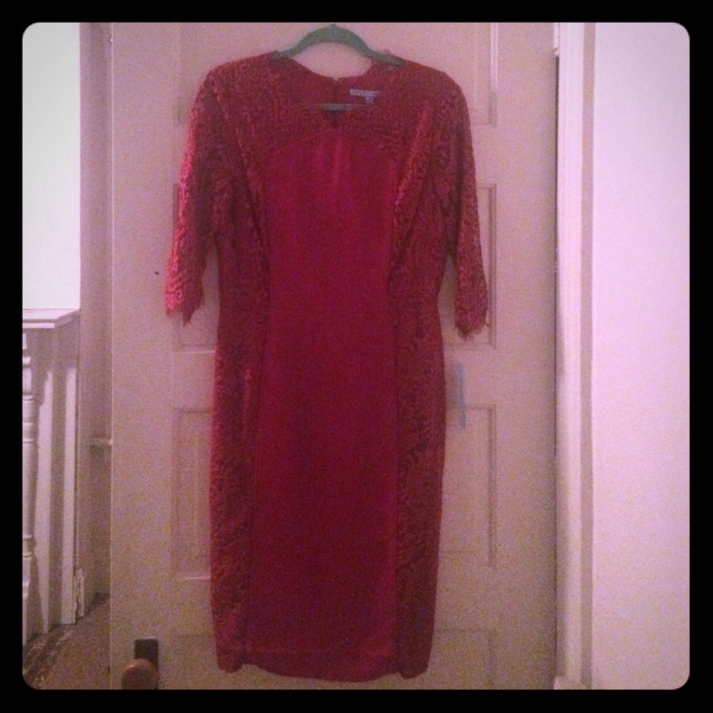 Formal red dress w/ lace sleeves.