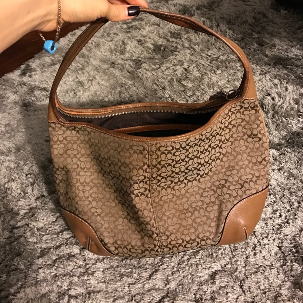 Coach tan leather and coach monogram design