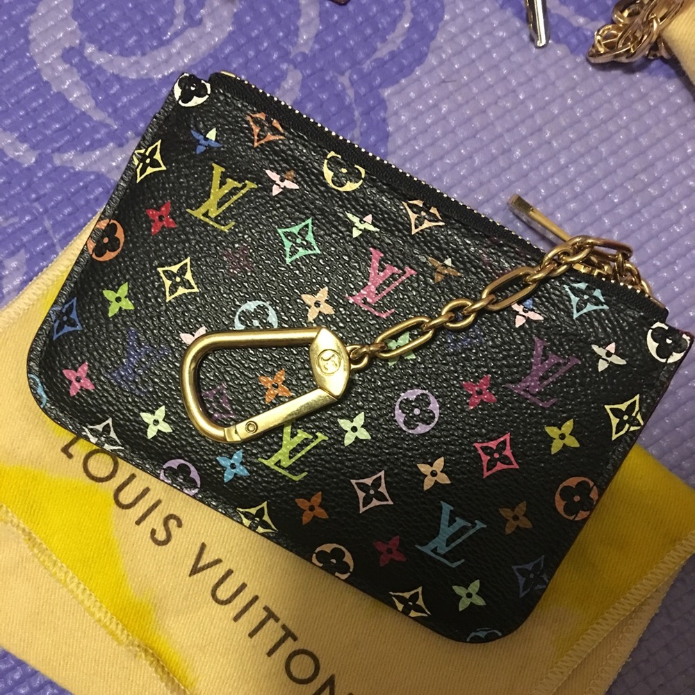 lv multicolor key punch with receipt sold
