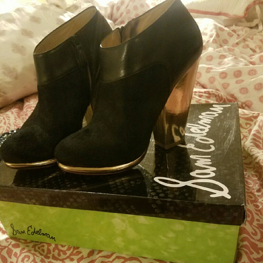 Black pony hair and leather booties