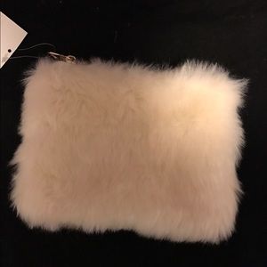 White flux fur clutch bag