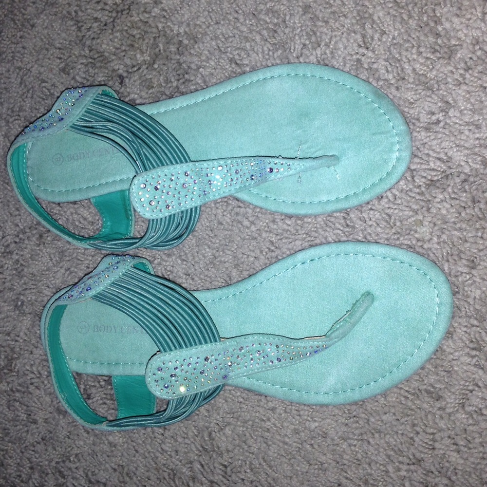 Turquoise sandals with studded accents