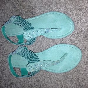 Turquoise sandals with studded accents