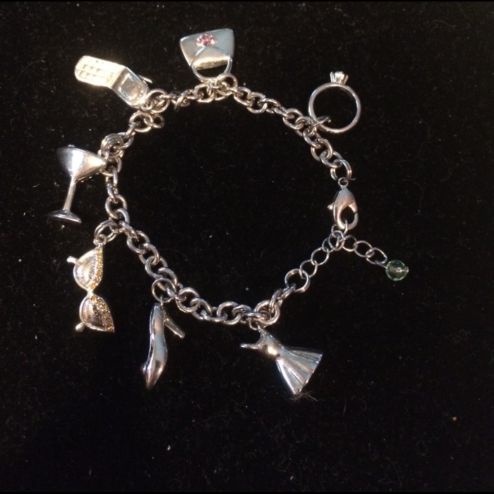 Lia Sophia   Silver charm bracelet.