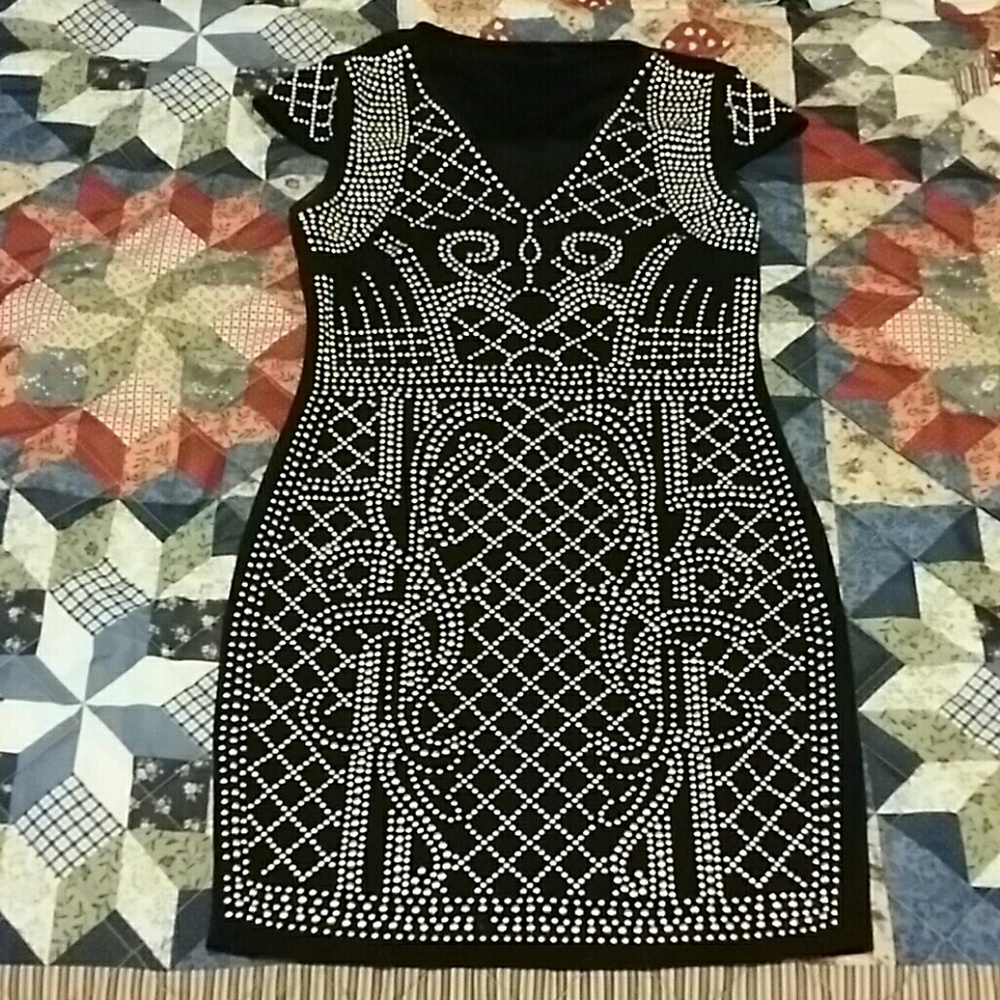 Studded black dress.