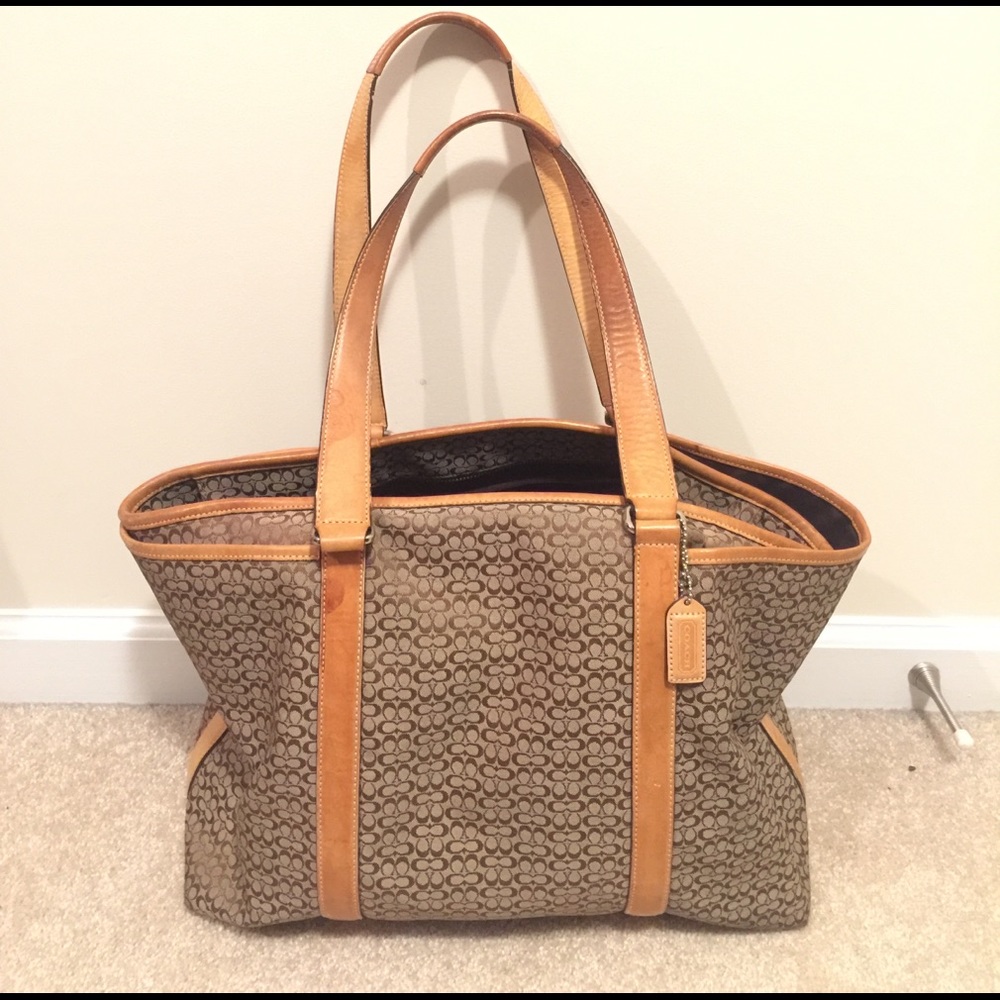 Coach diaper bag with changing pad