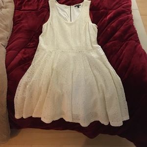 A white dress purchased for event never worn again