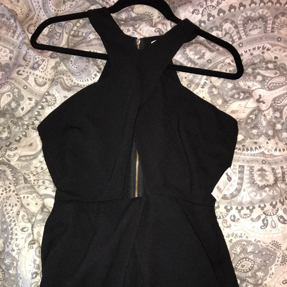Black romper size M NWT