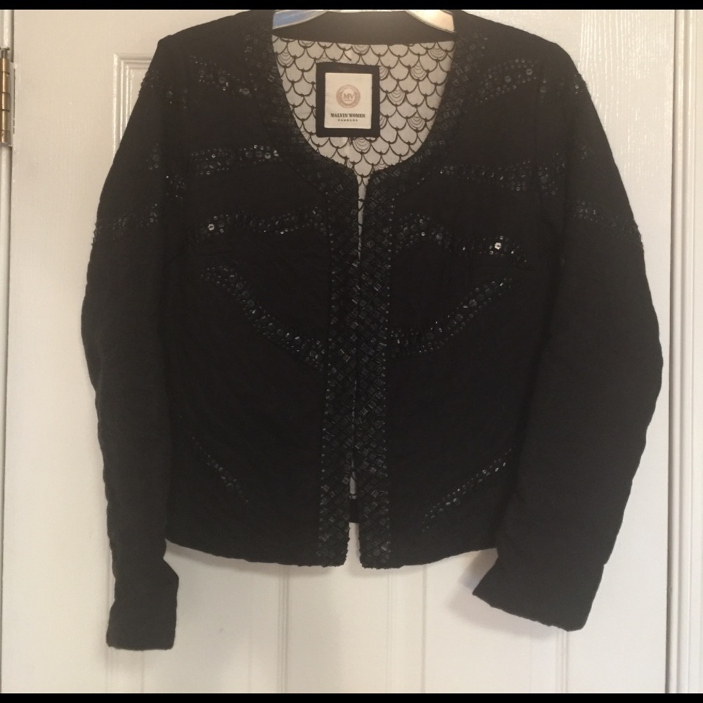 Eye catching beaded jacket by Malvin.