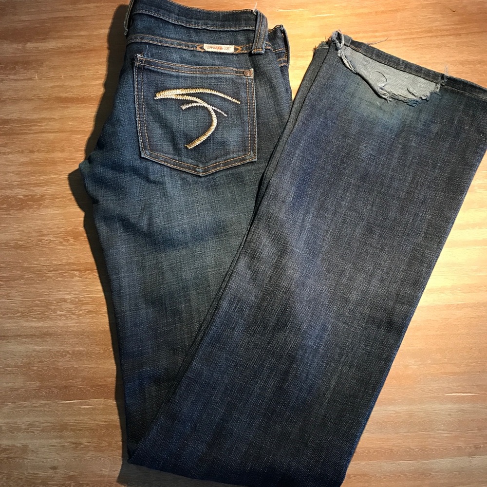 Frankie B. Medium Wash Flare Jeans.