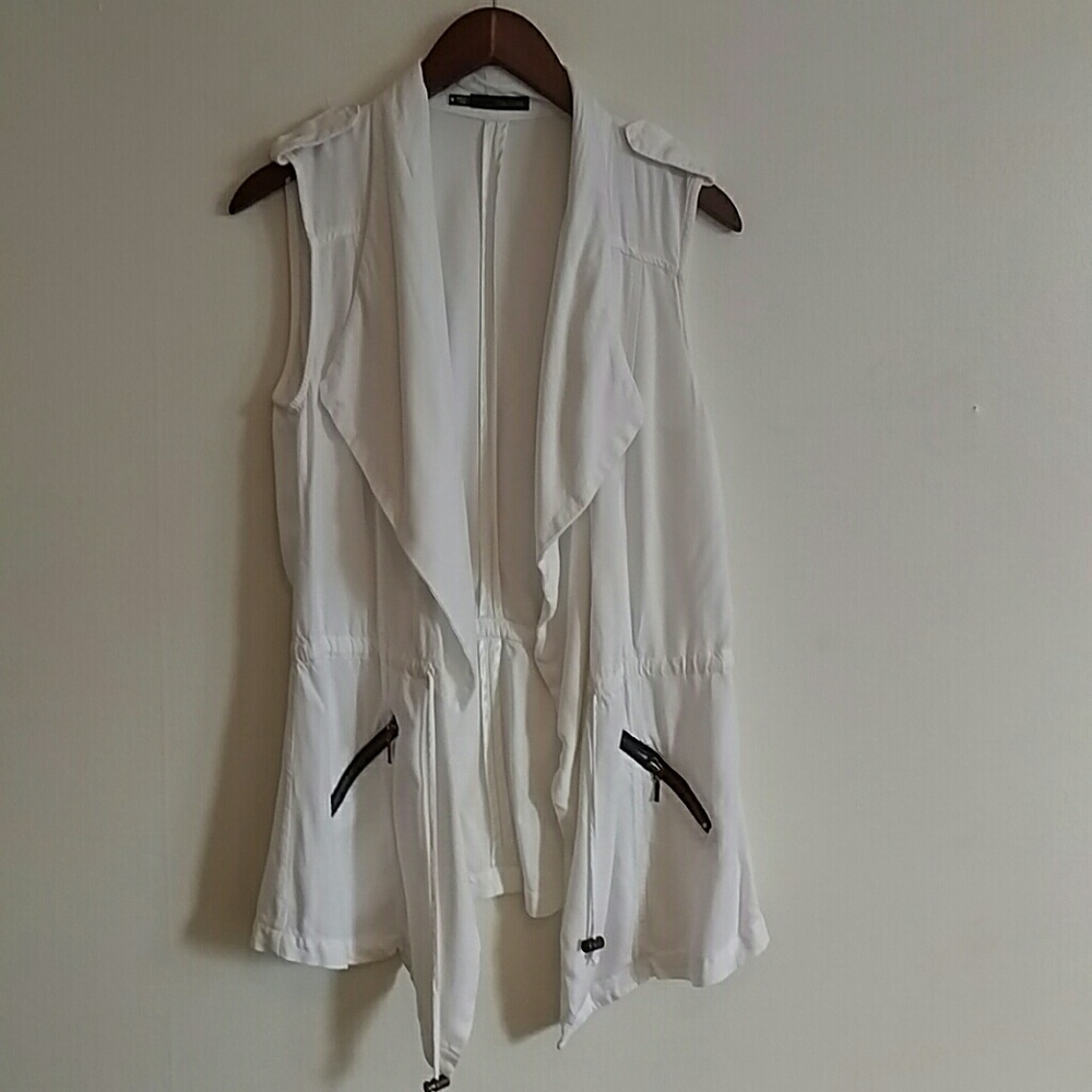 White safari vest