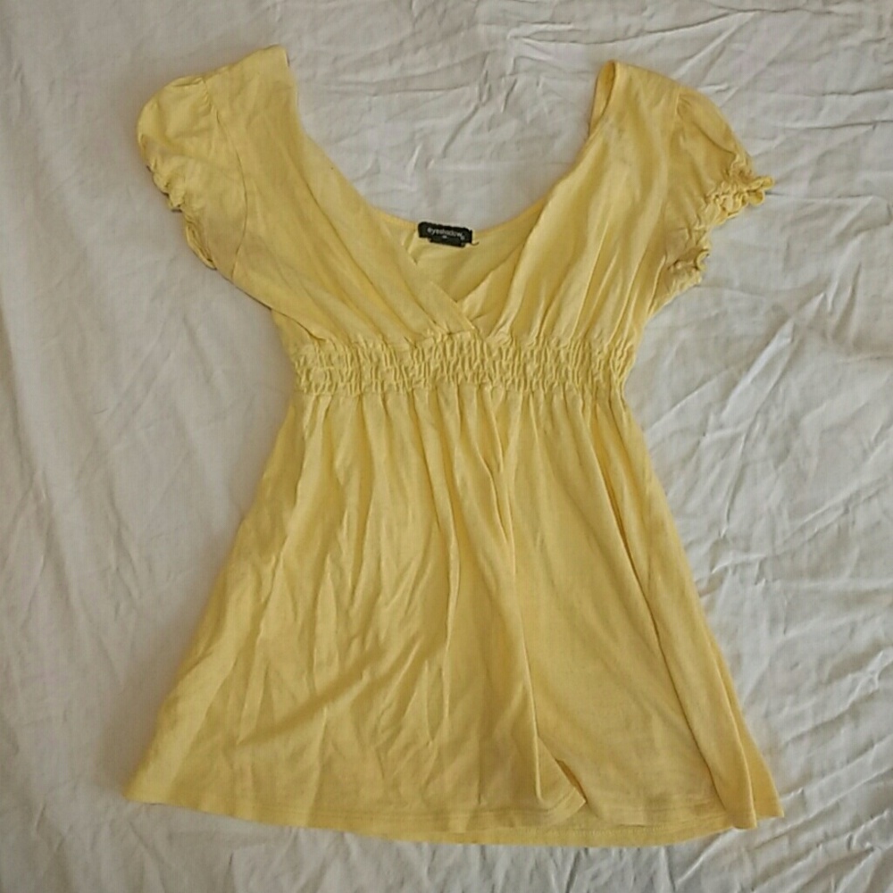 Medium light yellow shirt