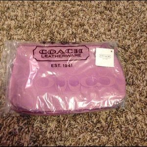 Purple coach wristlet