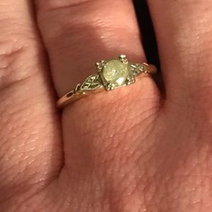 14k ring with light yellow diamond