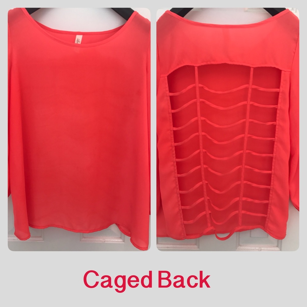 Orange top with open caged back. 3/4 sleeve
