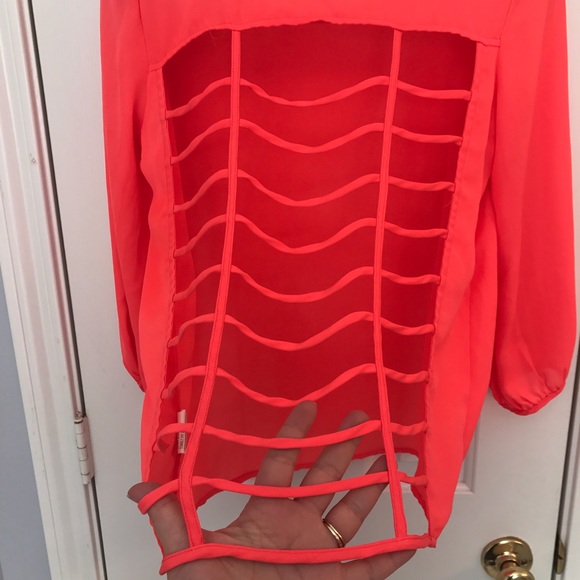 Orange top with open caged back. 3/4 sleeve - Picture 4 of 8