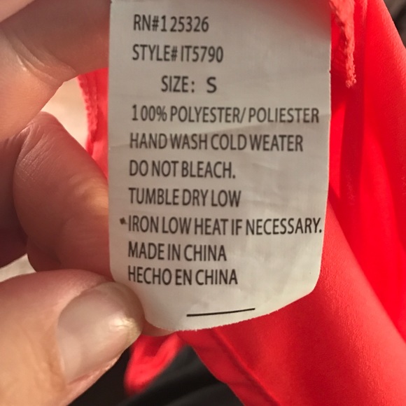 Orange top with open caged back. 3/4 sleeve - Picture 7 of 8