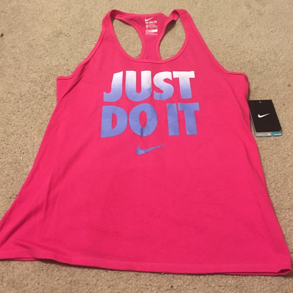 Pink Nike tank top.