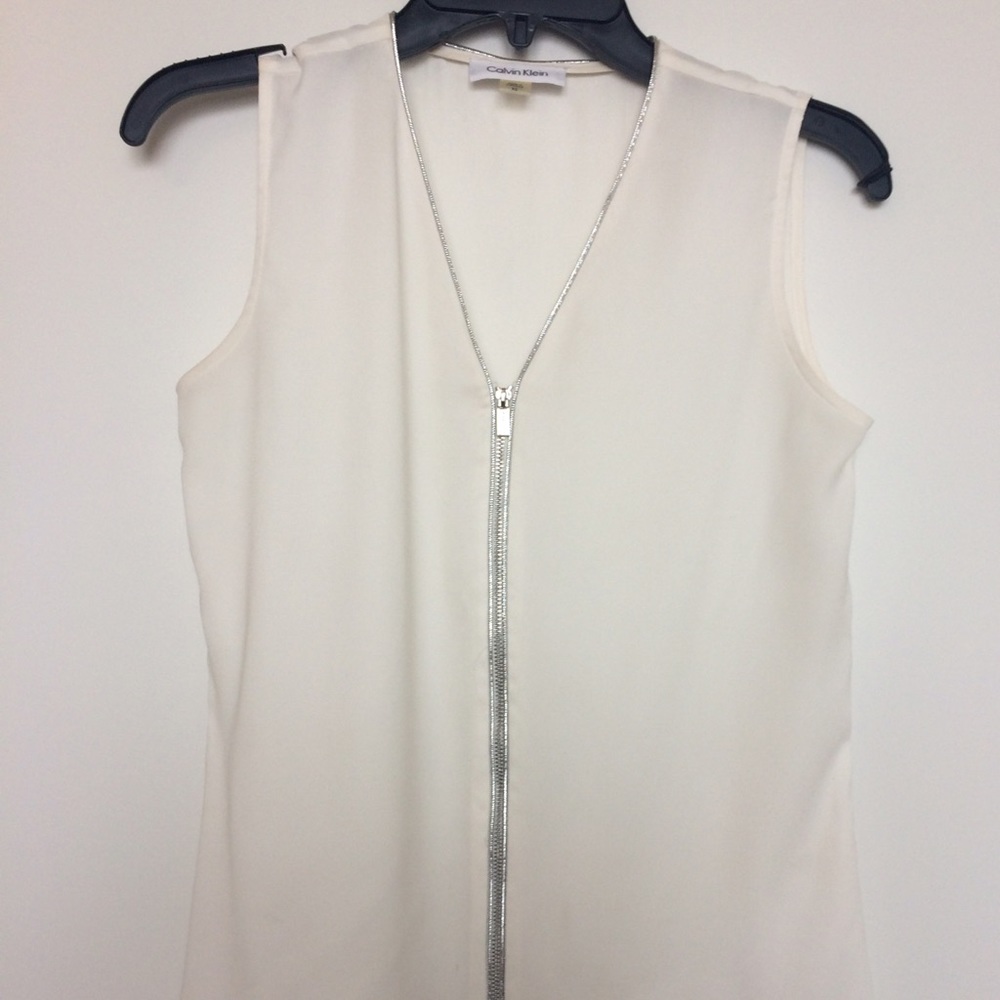 Calvin Klein white top with silver accent
