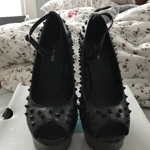 Black spiked heels