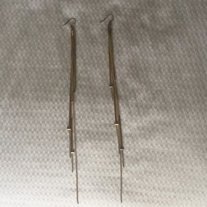 Extra long gold earrings